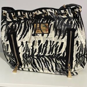 L.A.M.B. Bucket bag. GUC.